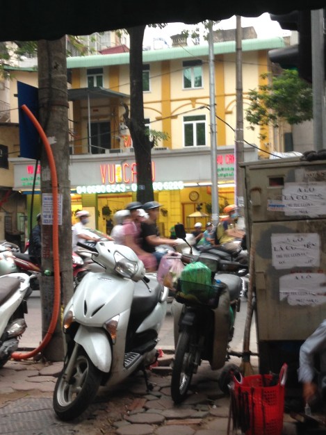 Tidal waves of scooters in non-stop Hanoi
