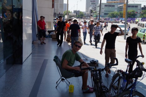 Trying out the new camping chairs on the streets on Cheng Du
