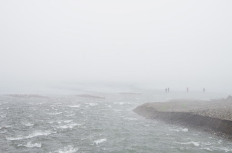 Stoic locals salmon fishing between the typhoons. Brave!